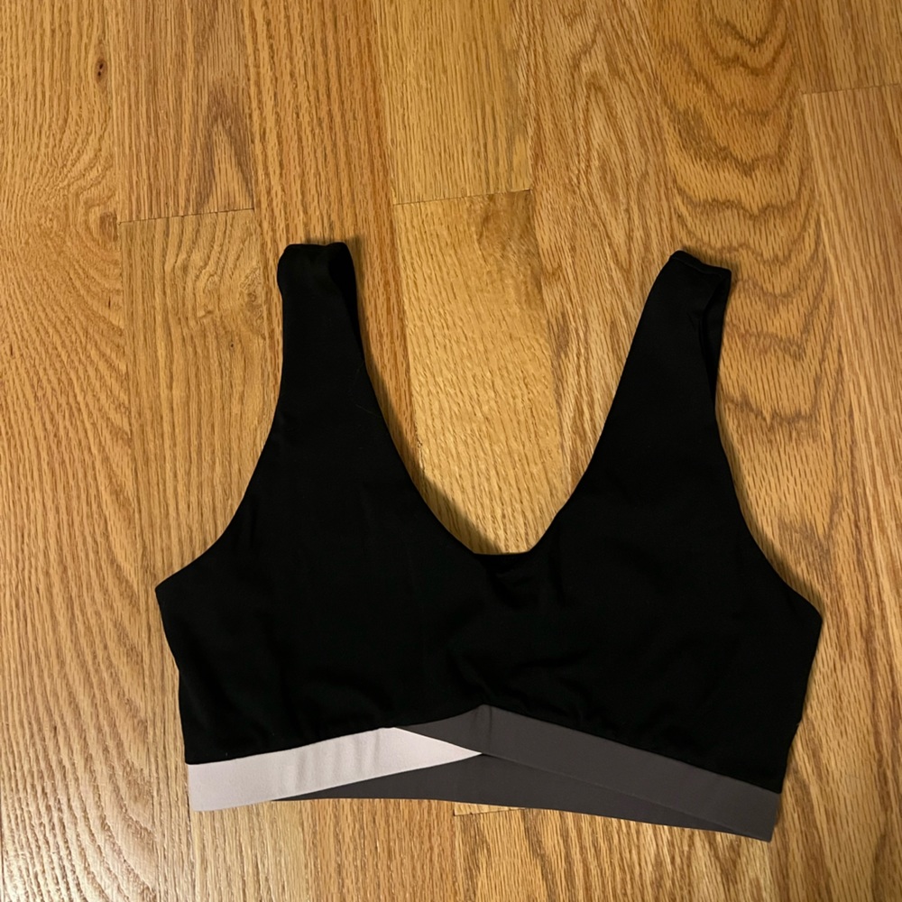 Black sports bra with gray/purple band